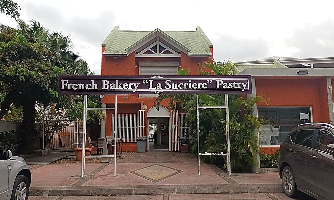 The La Sucriere storefront on Welfare Road, with the French Bakery sign, Sint Maarten